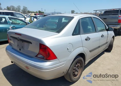 2001 Ford Focus Lx z USA, uszkodzony, nr VIN 1FAFP33P31W327982